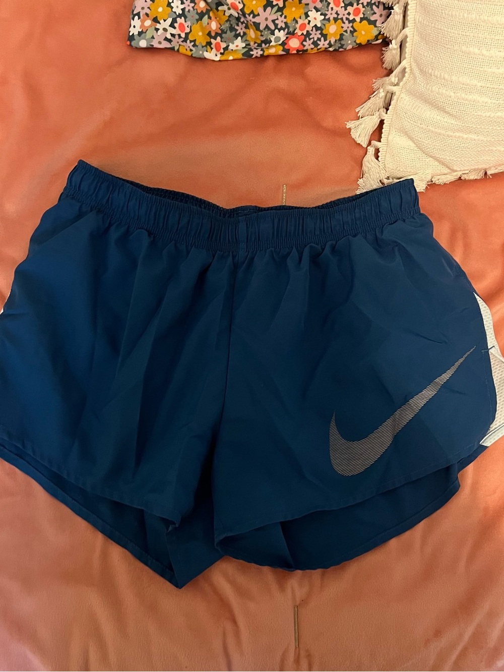 Nike Women's Navy Blue Athletic Shorts with Silver Swoosh